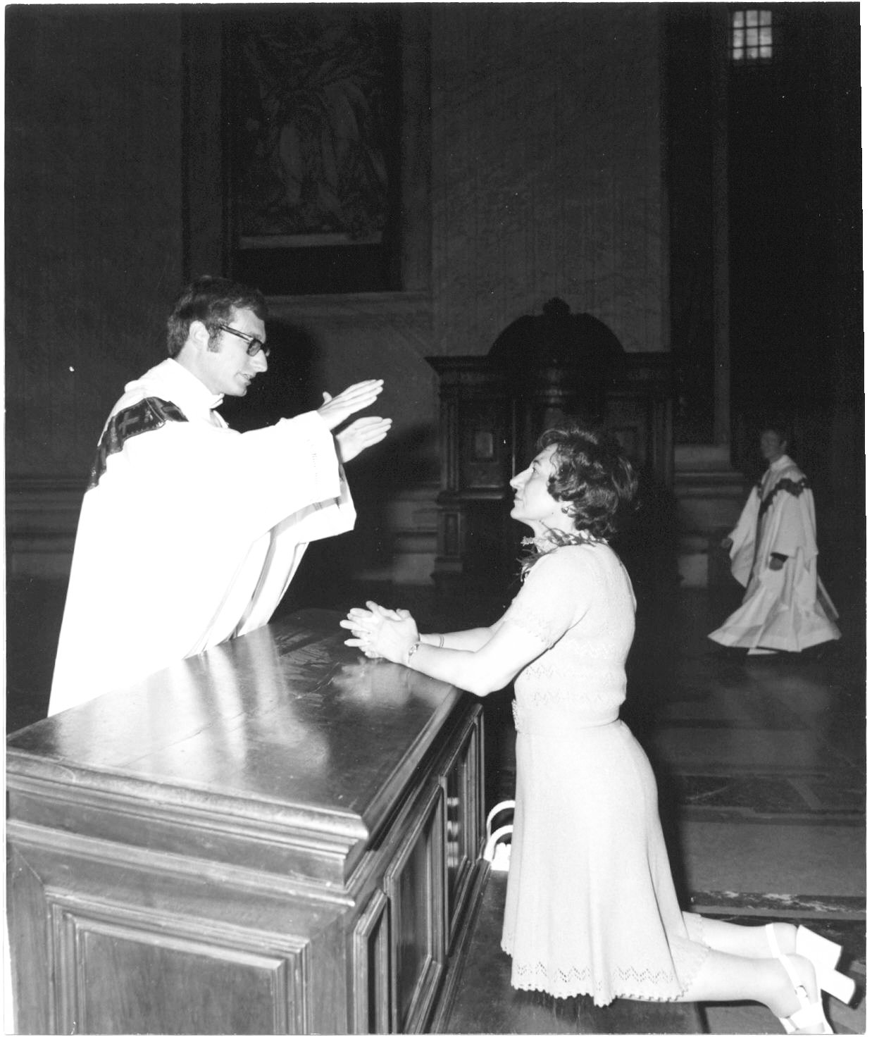 Lolita Evans receives a blessing from her son, then-Father Robert C. Evans, at St. Peter’s Basilica in Rome on July 3, 1973, the day after he was ordained a priest. Center,